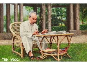 <img src="tranh-bac-ho-v002.jpg" alt="Tranh sơn dầu Bác Hồ ngồi làm việc trên ghế mây trang trọng">